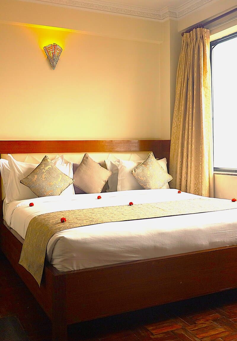 Comfortable room interior at Hotel Holy Himalaya